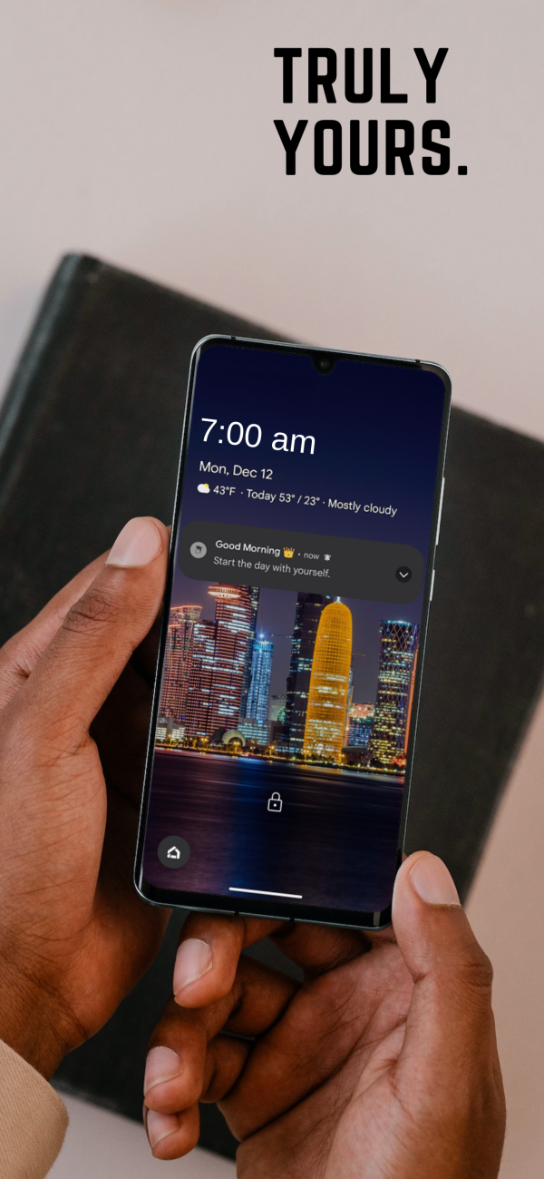 hands holding a phone with a notifcation from the black excellence daily app
